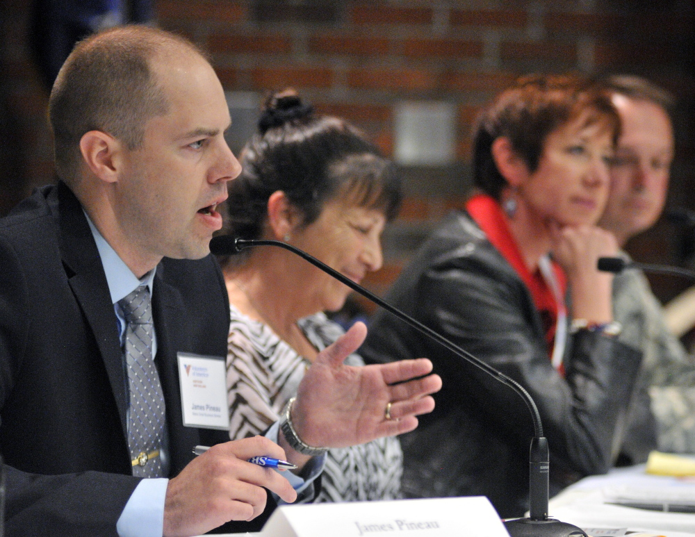 James Pineau, senior area manager for the Small Business Administration, left, speaks during a panel discussion about veterans’ employment issues on Tuesday at the University of Maine at Augusta.