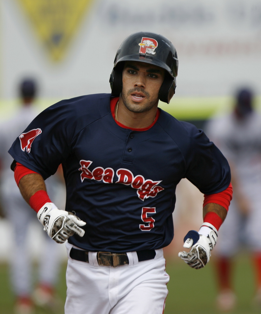 Carlos Asuaje circles the bases after one of his two home runs in the Sea Dogs’ 8-2 win Monday.