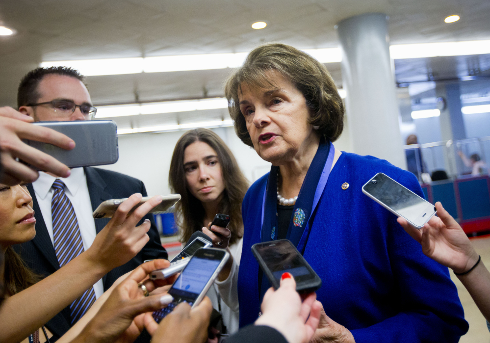 Senate Intelligence Committee Vice Chair Sen. Dianne Feinstein, D-Calif., speaks with reporters on Capitol Hill in Washington on Tuesday. Congress remade the post-9/11 surveillance program and sent the new legislation to President Obama for his signature.