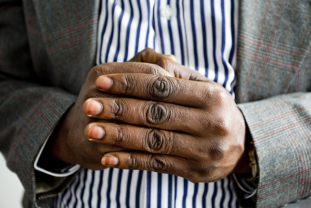 An asylum seeker in Portland, who asked that he not be identifiable because he fears that speaking out would endanger his family in the Democratic Republic of Congo.