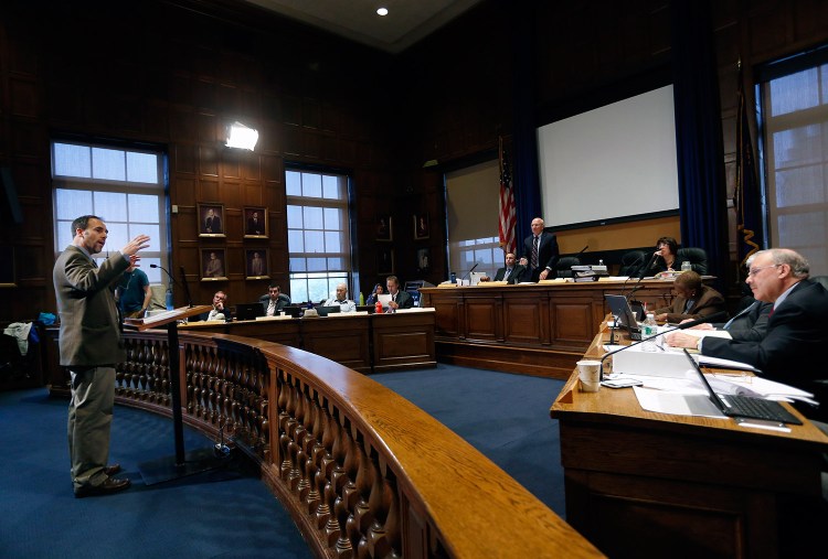 The Rev. Allen Ewing-Merrill of Hope Acts speaks to Portland city councilors Monday night as the council takes public comments on the municipal budget for the next fiscal year. The council later decided to postpone its vote on the budget until June 24.