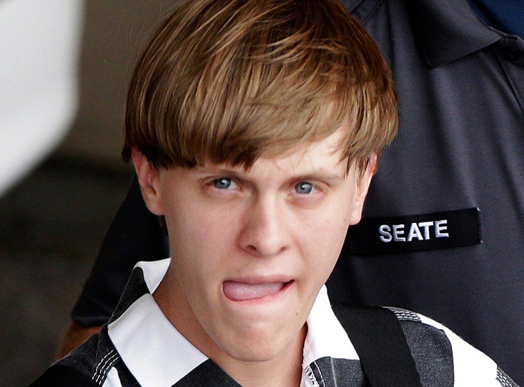 Charleston, S.C., shooting suspect Dylann Storm Roof is escorted from the Cleveland County Courthouse in Shelby, N.C., on Thursday. Roof is a suspect in the shooting deaths of nine people Wednesday night at the historic Emanuel African Methodist Episcopal Church in Charleston. 