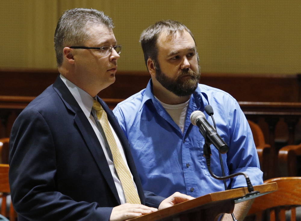 Philip Theberge, right, appears Thursday in Androscoggin County Superior Court with his attorney Adam Sherman. Theberge pleaded not guilty to one count of reckless conduct in the hayride crash that killed a teenage girl and injured 20 other people last fall.