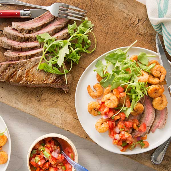 With Lighthouse Selections’ protein-packed, chili-lime marinated shrimp and a lean cut of steak, this tender, deliciously coastal Spicy Surf & Turf combo can be created in no time.
