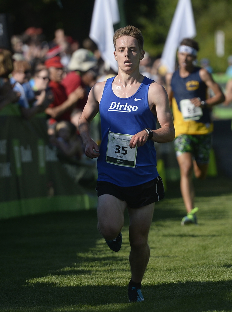 Ben Decker of Yarmouth is the first from Maine to cross the finish line of the TD Beach to Beacon 10K on Saturday.