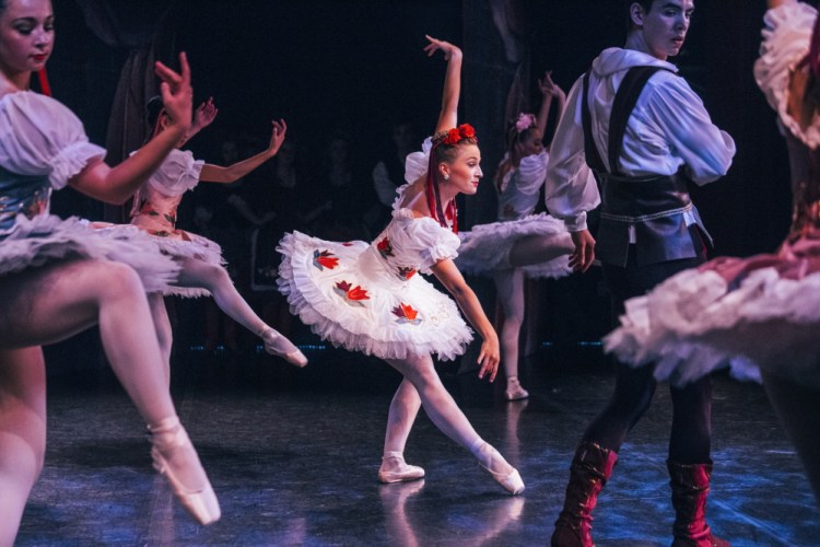 Maine State Ballet dancer Rhiannon Pelletier, who plays Swanhilda in the ballet Coppelia, dances with other company members during the dress rehearsal of Coppelia.