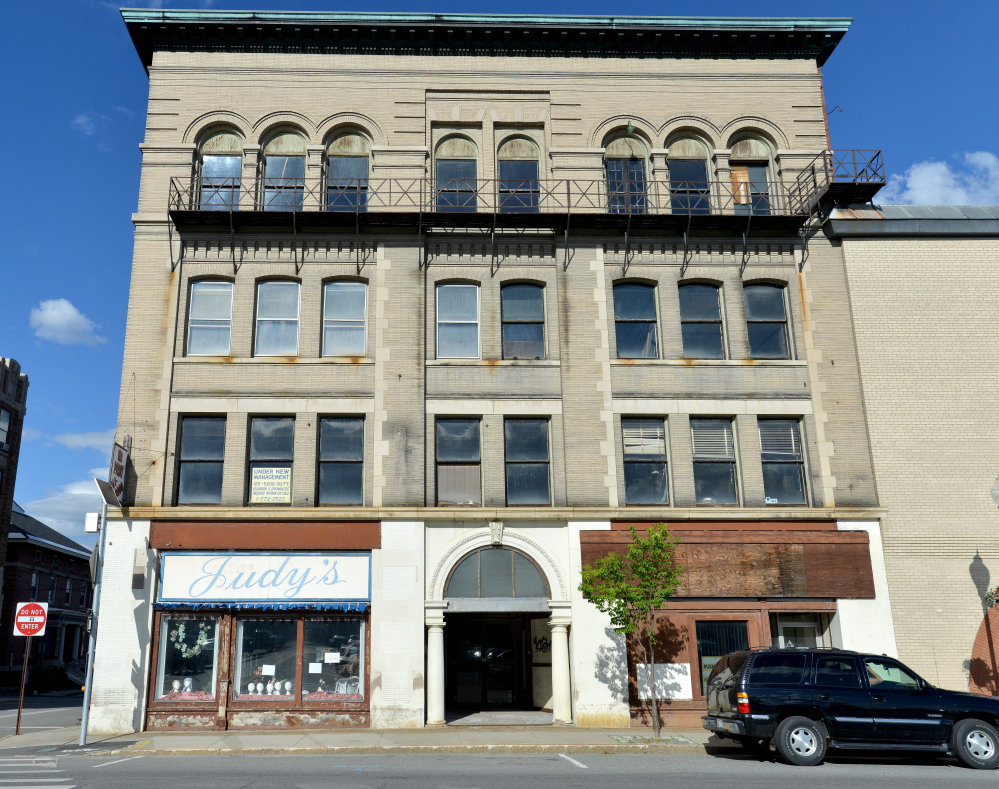 Colby College bought the Hains building, above, in July along with another downtown structure, and is under agreement to purchase a third building.