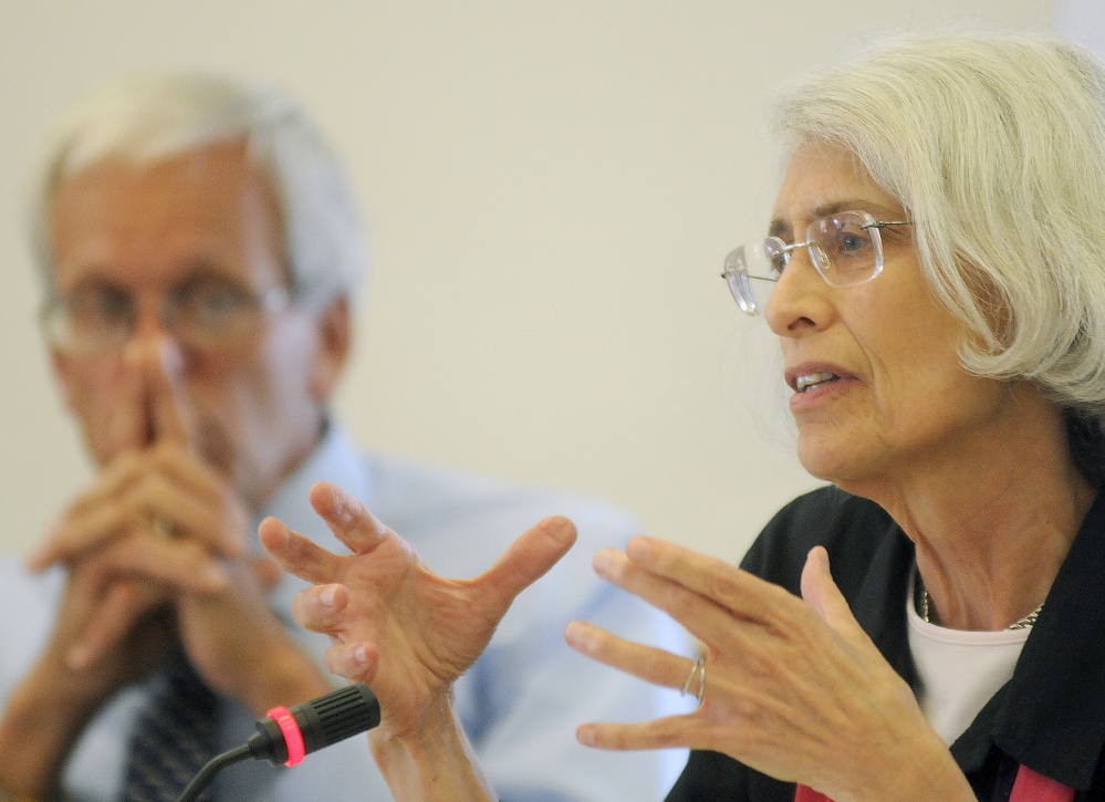 Rep. Peggy Rotundo, D-Lewiston, asks Mary Mayhew, commissioner of the Maine Department of Health and Human Services, a question Monday before the Legislature’s Appropriations and Financial Affairs Committee in Augusta. At left is Sen. Jim Hamper, R-Oxford.