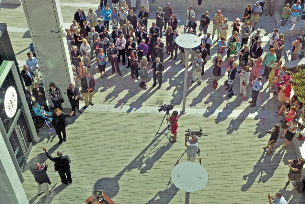 Gov. Paul LePage, bottom left, Maine Supreme Judicial Court Justice Joseph Jabar and Chief Justice Leigh Saufley celebrate on Friday after a ribbon-cutting ceremony at the Capital Judicial Center in Augusta.