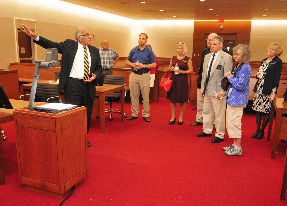 Supreme Court Justice Joseph Jabar leads a tour of a large courtroom Friday after the ceremonial opening of the Capital Judicial Center in Augusta.