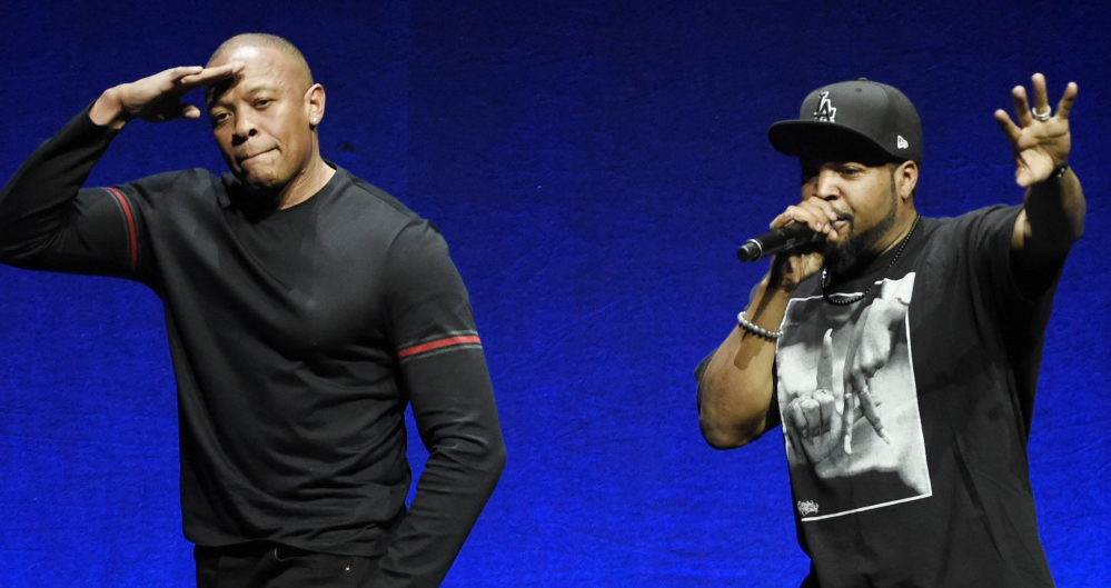 Rappers Dr. Dre, left, and Ice Cube are among the parties being sued by Jerry Heller, who alleges his reputation was damaged by the film “Straight Outta Compton.”