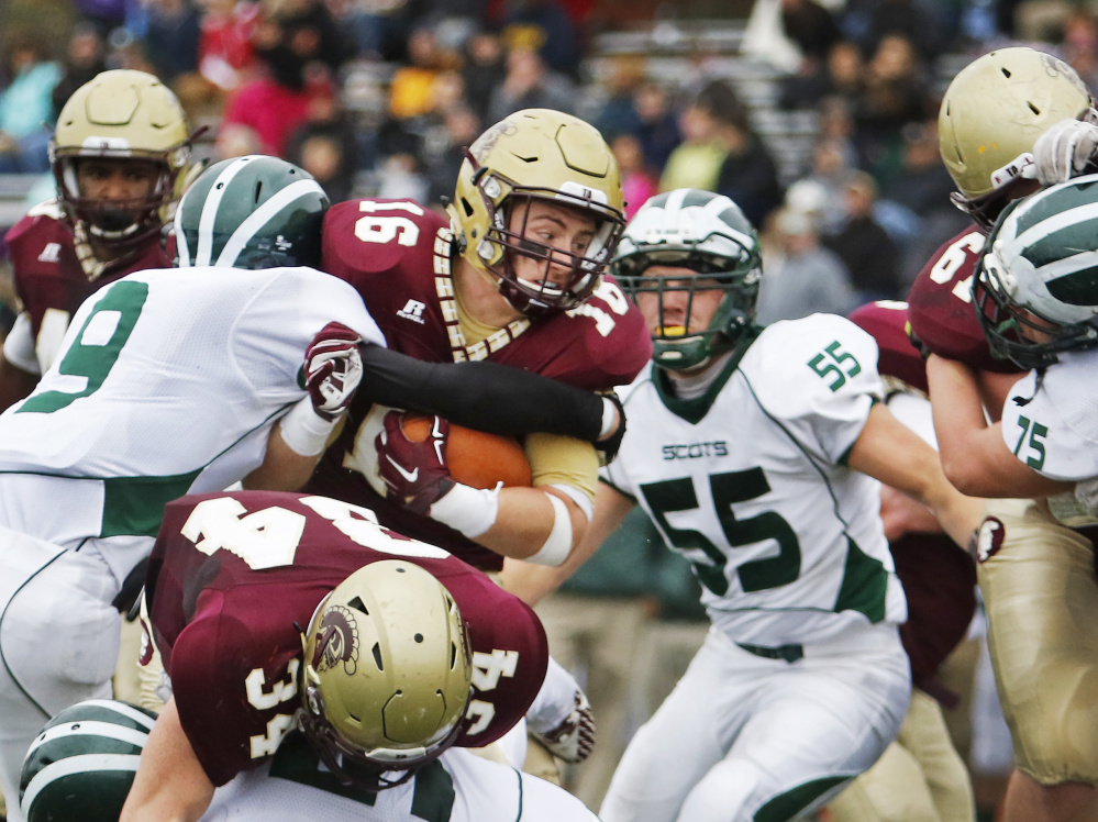 There are no surprises when Bonny Eagle plays Thornton Academy. This will be their third straight meeting in a regional final and every yard is earned, as Michael Laverriere of Thornton discovered in their regular-season game.  Jill Brady/Staff Photographer