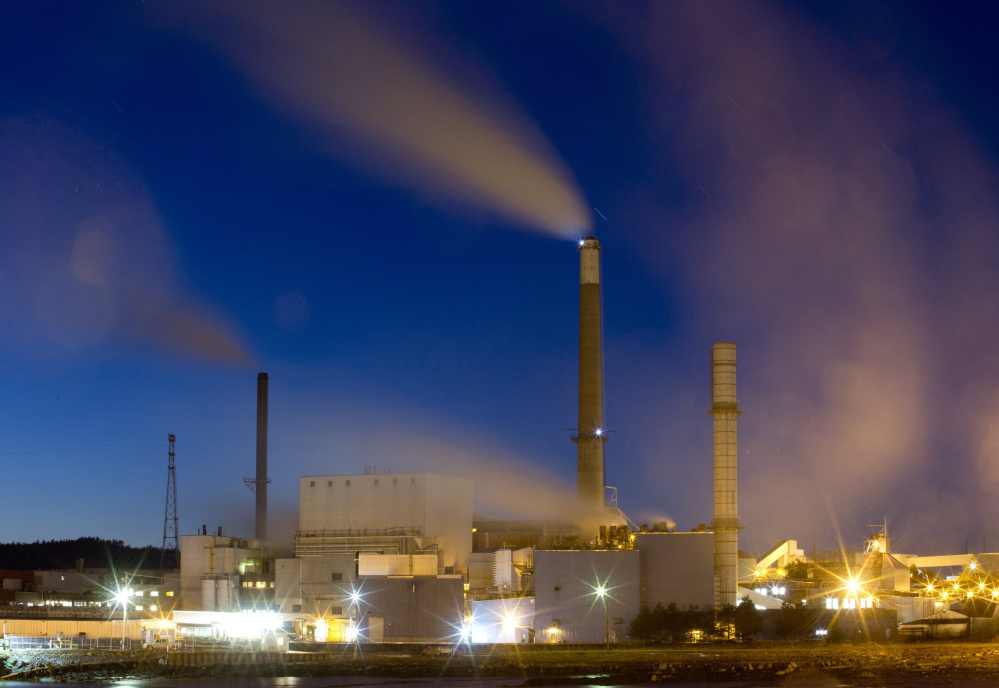 A three-minute exposure shows smoke emitted by the Verso paper mill in Bucksport before it closed last year. Maine exported pulp and paper worth nearly $500 million in 2014, easily topping lobster exports at $349 million.