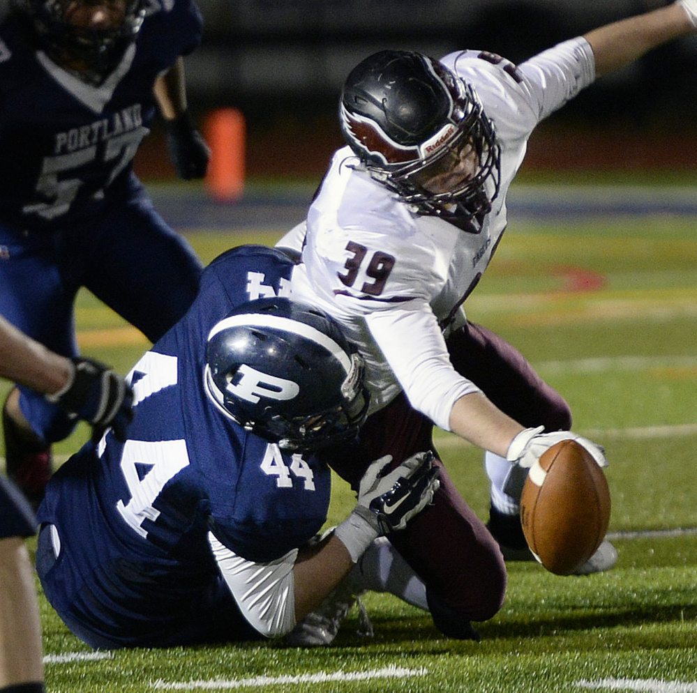 Joe Fusco of Portland, 44, forces a fumble, and that’s nothing new. Just part of a can-do-it-all defense that has five shutouts in 10 games.