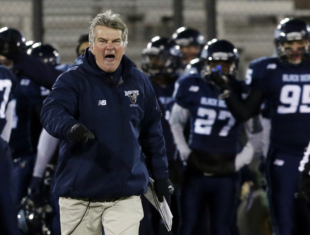 Coach Cosgrove disputes a call with referees in a football game last year. He coached his last game Saturday, a 22-6 loss to New Hampshire that left the Black Bears with a 3-8 record, UMaine’s worst since 1995.