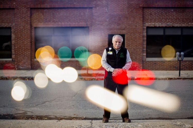 Duncan Perry, 69, a volunteer with the Trauma Intervention Program in Greater Portland, offers comfort and liaison services to victims and their families during emergencies. This double exposure captures the Scarborough resident on a Portland street this week. “I believe that when you live in a community, you have the responsibility to contribute to that community,” he said.
Gabe Souza/Staff Photographer