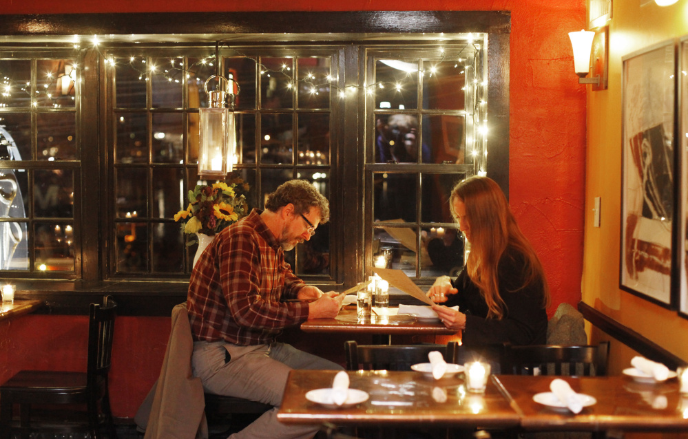 Jeff Symes and Melissa Pazdon Symes of Northwood, N.H., peruse the menu.