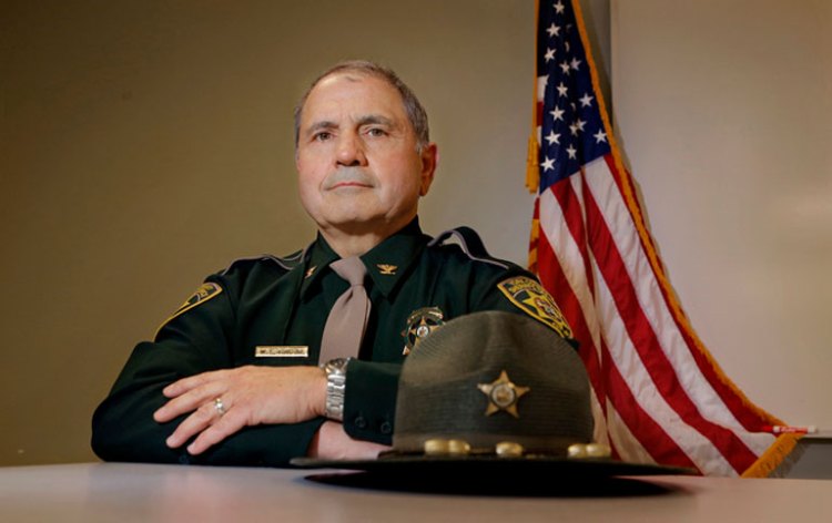 Chief Deputy William King of the York County Sheriff’s Office works with seniors to help them avoid financial scams and identity theft. Gregory Rec / Staff Photographer