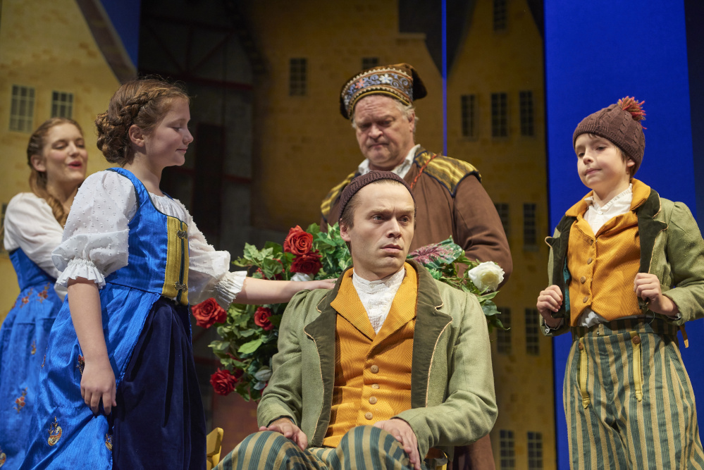 Kai (Ian Carlsen) sees The Snow Queen (Karen MacDonald) in Portland Stage Theater's production of "The Snow Queen."