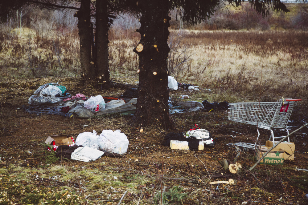 Multiple tents, food waste, hypodermic needles and a rusted gun were among the items removed by state crews from a camp near the Exit 5 off-ramp on I-295. “These places are bad. Our crews have to be very careful cleaning this stuff,” said Tim Cusick of the Maine DOT.