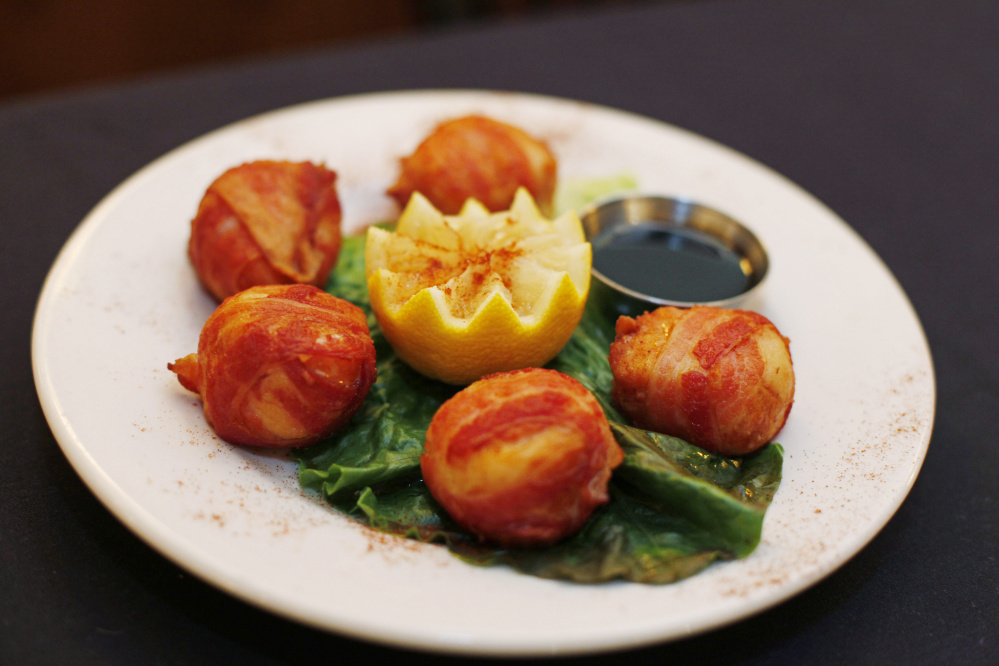 Scallops wrapped in bacon