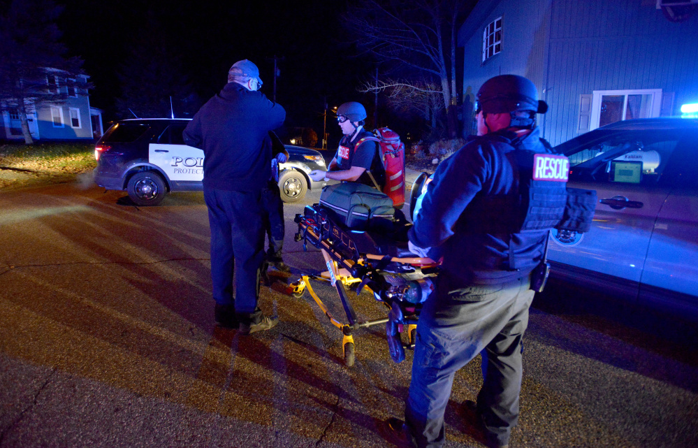 First responders prepare to enter the shooting scene in Oakland on Nov. 4 that left four people dead, including the shooter. Agencies that responded to the shooting completed post-incident debriefing for responders exposed to traumatic situations, a program offered through Crisis & Counseling Centers.