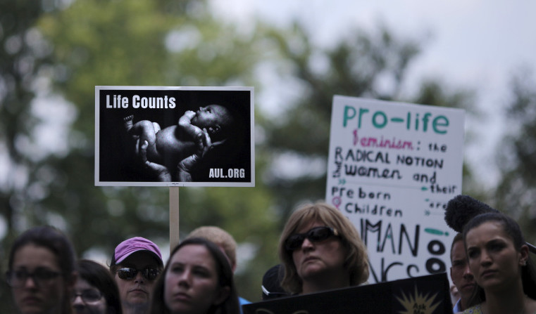Women attend a July 28 Washington rally in favor of defunding Planned Parenthood. Claims that the nonprofit organization’s health care services aren’t needed are based on inaccurate information.
