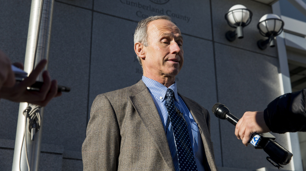 Attorney Daniel Warren, who represents the parents of suspect Matthew Gwyer, speaks to reporters Monday outside the Cumberland County Courthouse in Portland. “This is a tragedy for everyone involved,” Warren said.