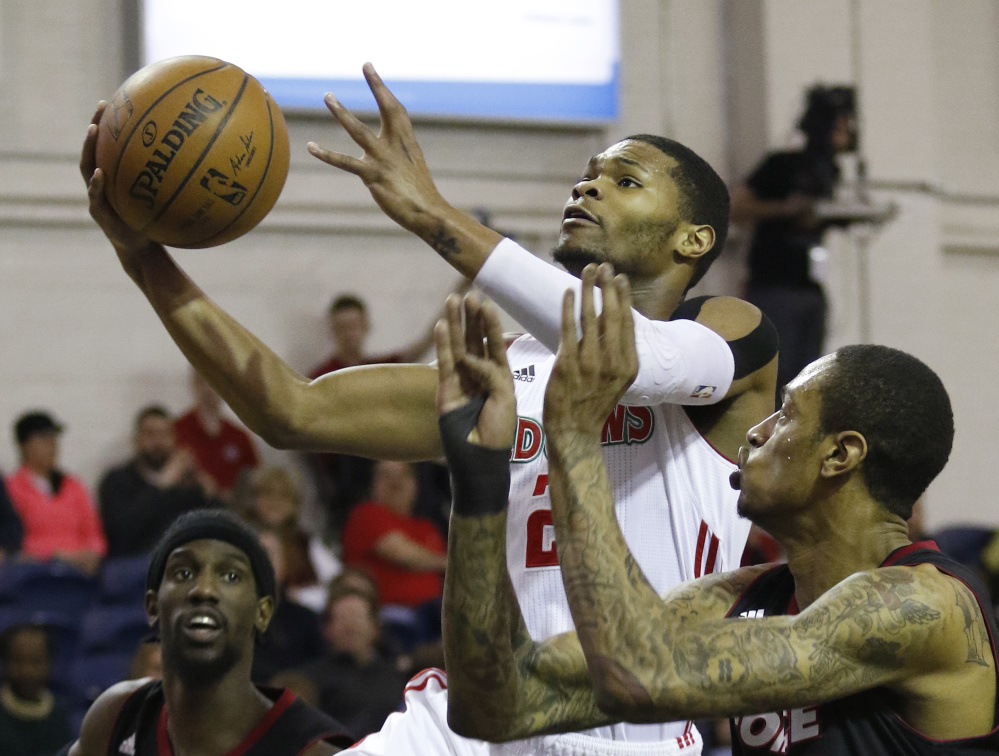 Corey Walden of the Red Claws goes up for a layup Sunday against the Sioux Falls Skyforce during Maine’s 132-111 victory at the Portland Expo.