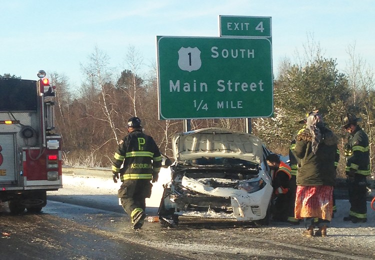 Crews clean up an accident between a car and a plow truck on I-295 between exit 4 and 5. Photo courtesy of Maine Department of Transportation.