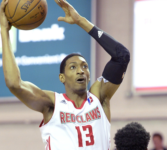 Malcolm Miller of the Red Claws goes up for a shot against Ramon Harris of the Iowa Energy during Maine’s 123-106 loss Friday night at the Portland Expo.