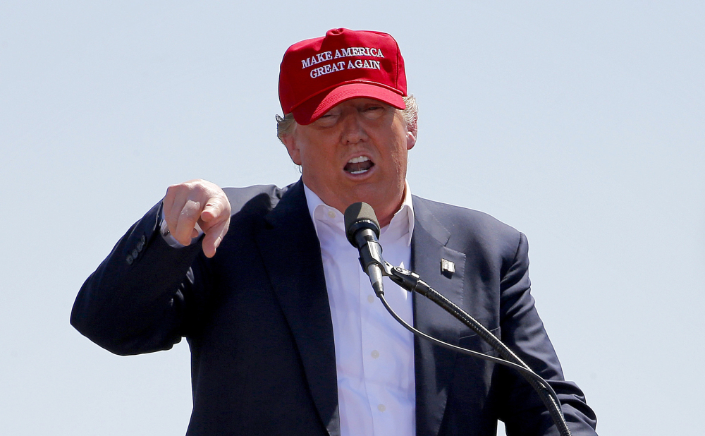 Above: On June 28, 1968, former Alabama governor and presidential candidate  George Wallace arrives in Boston. Like Donald Trump’s, his rallies turned violent. At left: Republican presidential candidate Donald Trump,  stirs up the crowd at a campaign rally in Fountain Hills, Ariz., on March 19. He