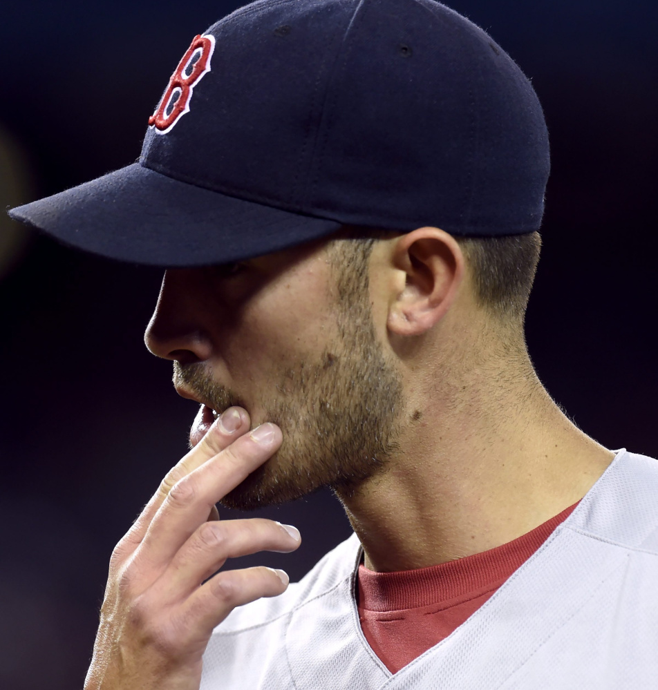 Rick Porcello gave up a two-run homer to Toronto's Jose Bautista in the first inning Saturday, but he settled down to throw six innings in a 8-4 win.