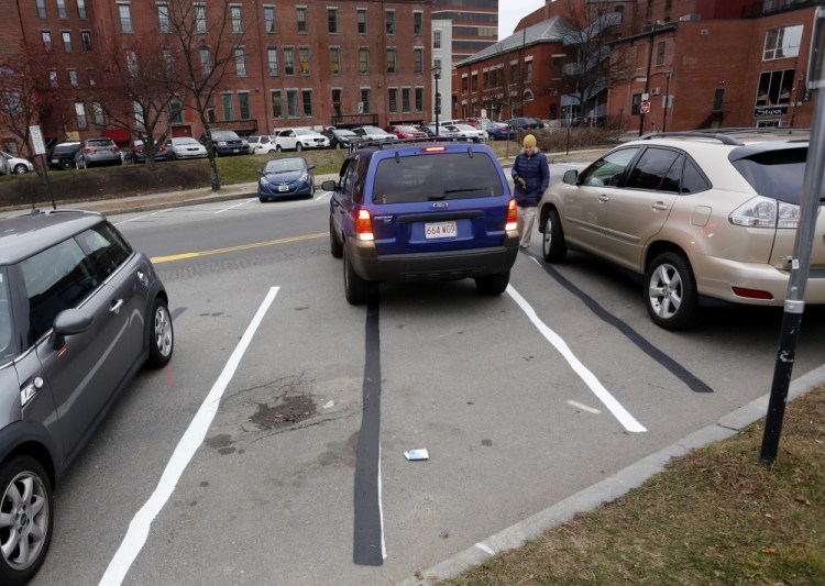 Drivers will no longer have to back into parking spots on Spring Street in downtown Portland as the city will change to nose-in spots next week.