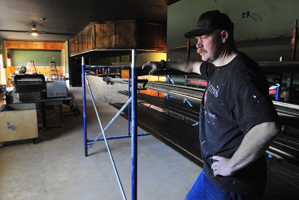 Chris Shaw talks about renovation work to the former Bridge Street Tavern, which will open as a new bar and restaurant in June, during an interview on Thursday in Augusta.