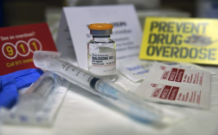 A kit with naloxone, also known by its brand name Narcan. An overdose of opiates essentially makes the body forget to breathe. Naloxone works by blocking the brain receptors that opiates latch onto and helping the body "remember" to take in air. The Associated Press