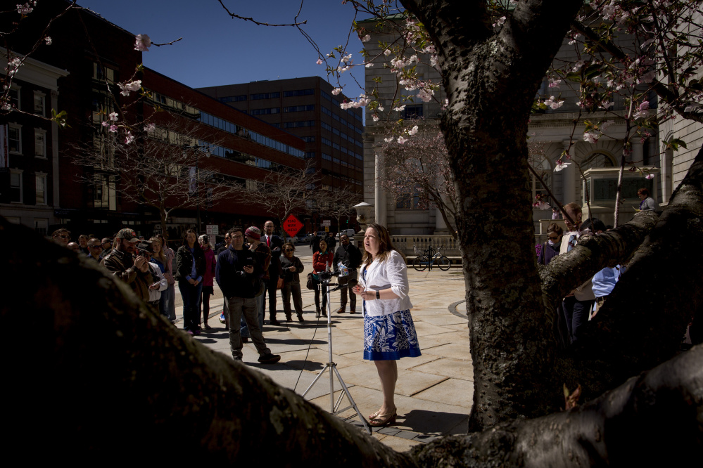 State Rep. Diane Russell, D-Portland, addresses people who attended a news conference and rally at Portland City Hall on Thursday to speak out against the proposed closing of the India Street Public Health Center.