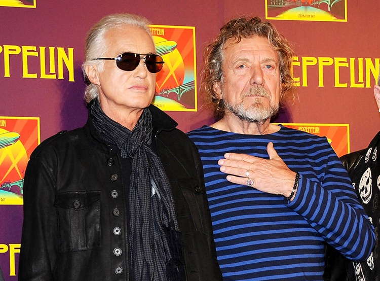 Led Zeppelin guitarist Jimmy Page, left, and singer Robert Plant appear at a press conference ahead of the  theatrical release of "Celebration Day," a concert film of their 2007 London O2 arena reunion show. Evan Agostini/Invision/AP