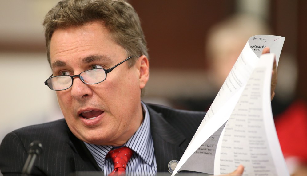 Nevada Assemblyman Brent Jones owns a company that is being sued as a former employee alleges raises were tied to Scientology-themed activities.