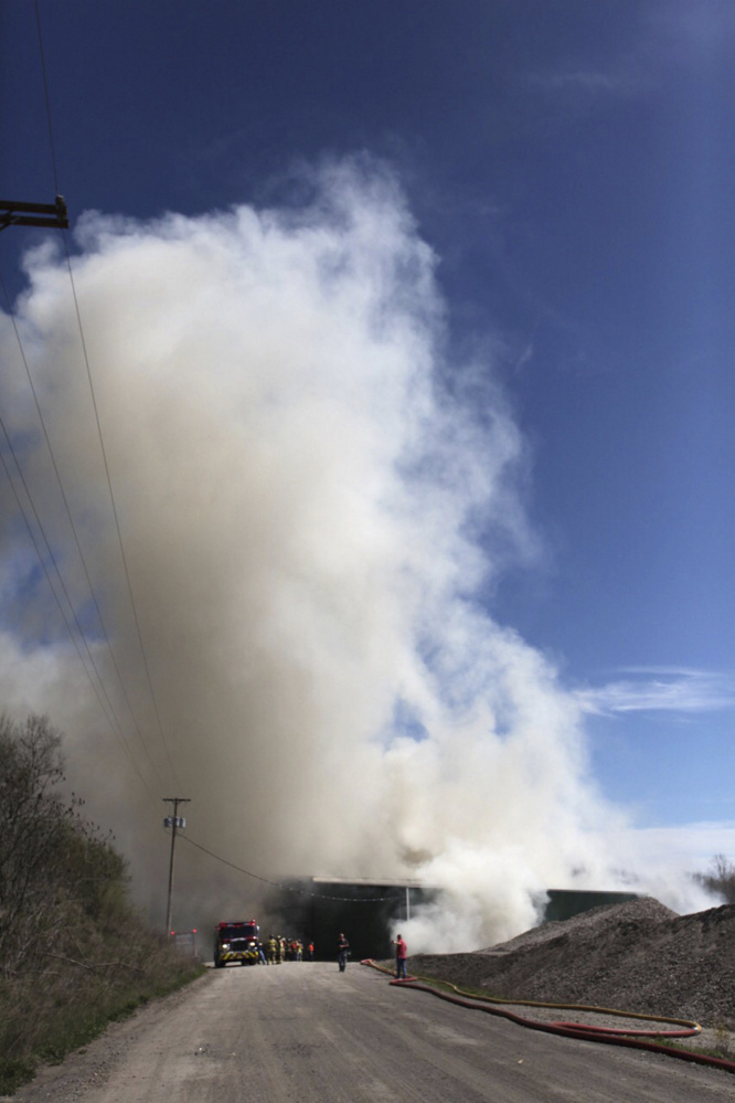 Firefighters from 15 communities fought a fire at Aggregate Recycling Corporation on Route 236, also known as Dow Highway, in Eliot on Tuesday.