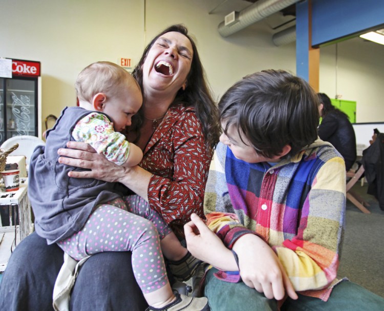 Baby Sparrow with Pignatello and brother Royal at Crofter’s Market in Portland. Sparrow, who was scared of the family’s big bathtub, gets bathed in a small vintage washtub. Jill Brady/Staff Photographer