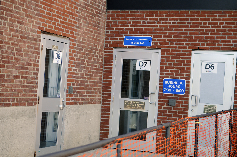 The Department of Health and Human Services health lab in Augusta was ordered to pay a fine and to cover the cost of equipment for fire departments in Augusta and Waterville.