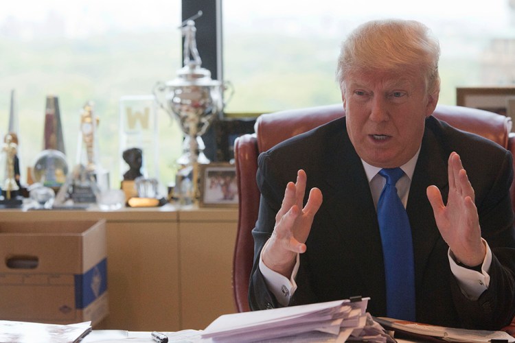 Donald Trump responds to a question during an interview at his office in Trump Tower in May. (The Associated Press)