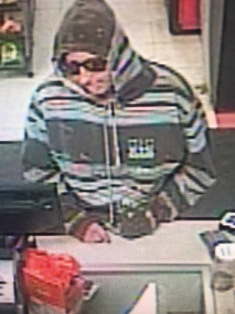 Police say this woman stole cash from the Big Apple store on Stone Street Tuesday. 