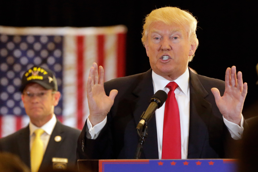 Republican presidential candidate Donald Trump answers questions during a news conference in New York on Tuesday. New details about Trump University were revealed in documents released Tuesday.