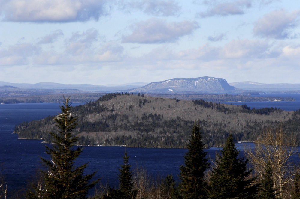 Moosehead Lake's iconic Mt. Kineo rises in the Moosehead Lake area. A 26-turbine wind farm has been planned by SunEdison in the Misery Ridge area of Somerset County, near Moosehead Lake.