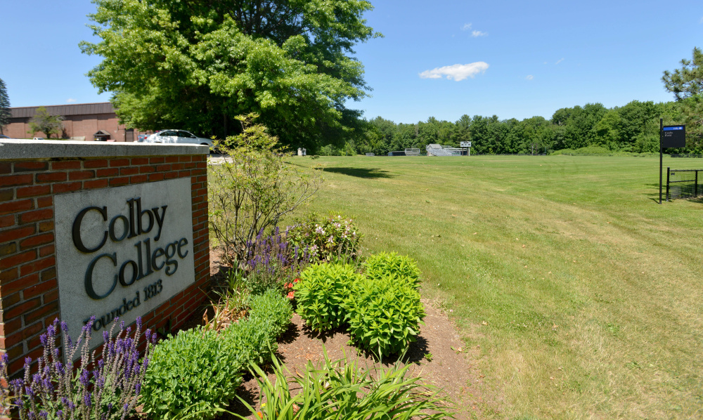 In this area behind Colby College's Harold Alfond Athletic Center, the college plans to build three athletic fields, one of which will have artificial turf. Work on the fields could begin this fall, with the goal of their being ready for use a year later.