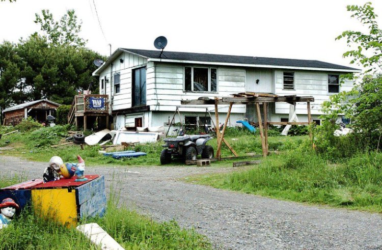 A 7-year-old boy was killed June 4 by a pit bull at this home at 207 Moodys Mills Road in Corinna. The medical examiner's report documents the details of the brutal attack.