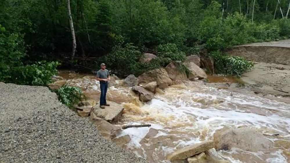 Old Spencer Road in northern Somerset County was washed out in Tuesday's storm. Some area residents are trapped by washouts of Spencer and other roads, and repair estimates are close to $1 million.