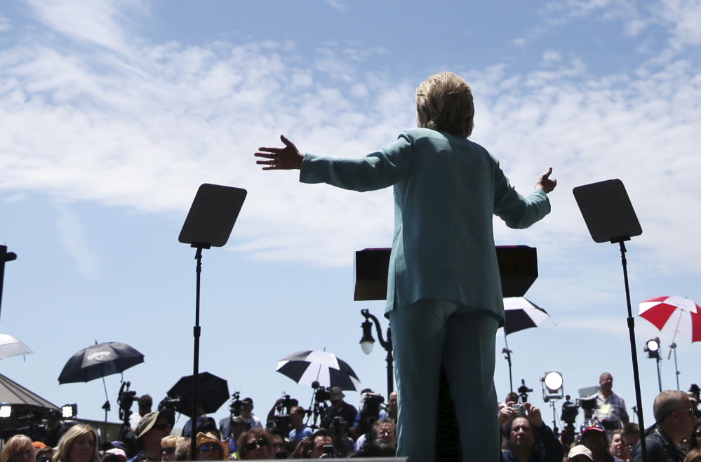 Speaking in Atlantic City, N.J., with Donald Trump's shuttered casino behind her, Democratic presidential candidate Hillary Clinton called Trump a 'shameful' businessman Wednesday.